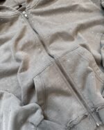 77 pop star” zip ups white